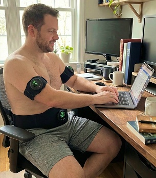 Carbon Core core and arm straps worn at a desk